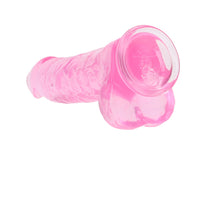 RealRock Crystal Clear Realistic 10 in. Dildo With Balls and Suction Cup Pink